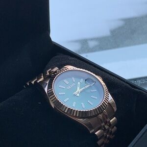 Seiko Rose Gold Timepiece with Green Face